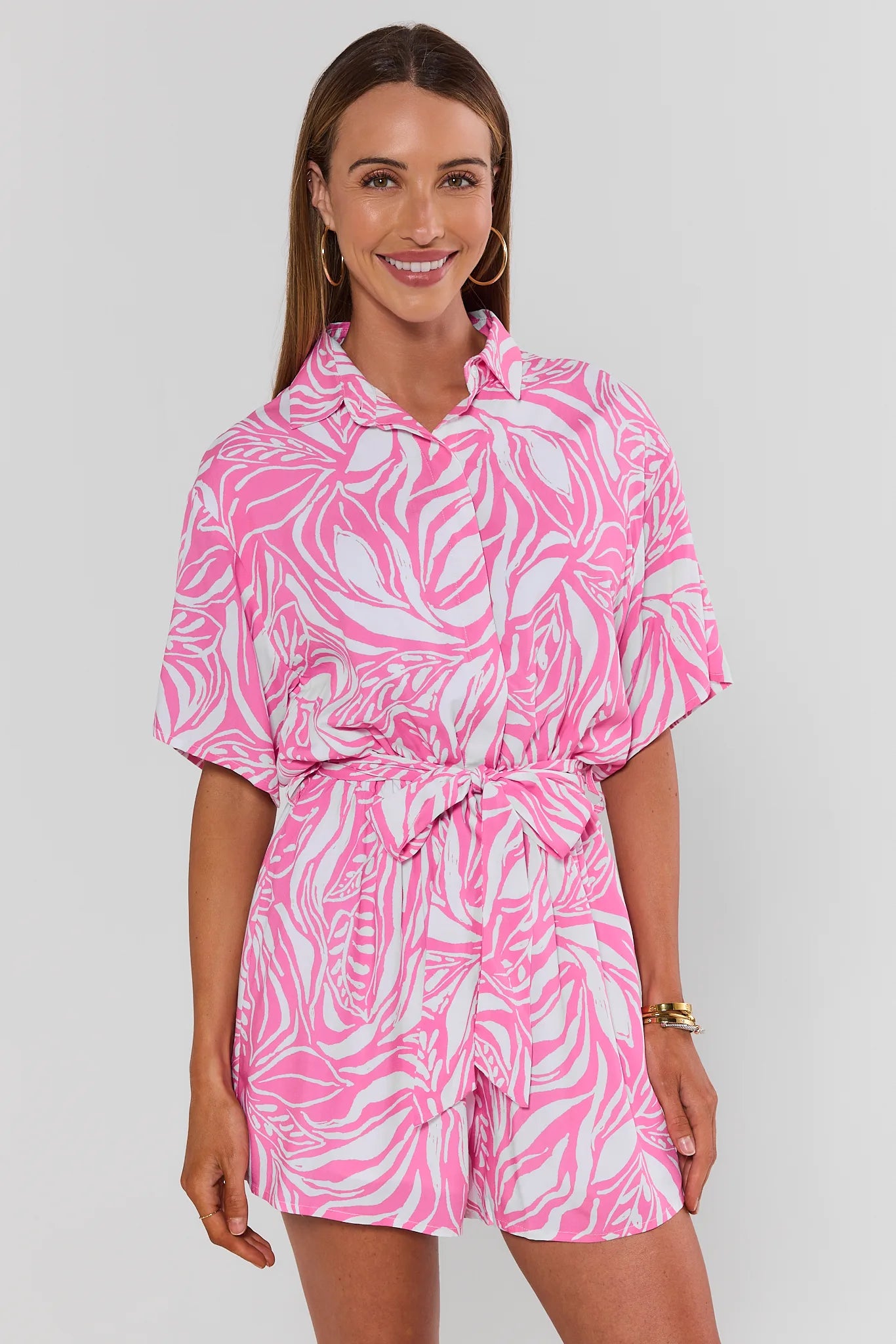 Tampilan kasual dan manis Pink Print Button Up Romper dari koleksi GIAT4D
