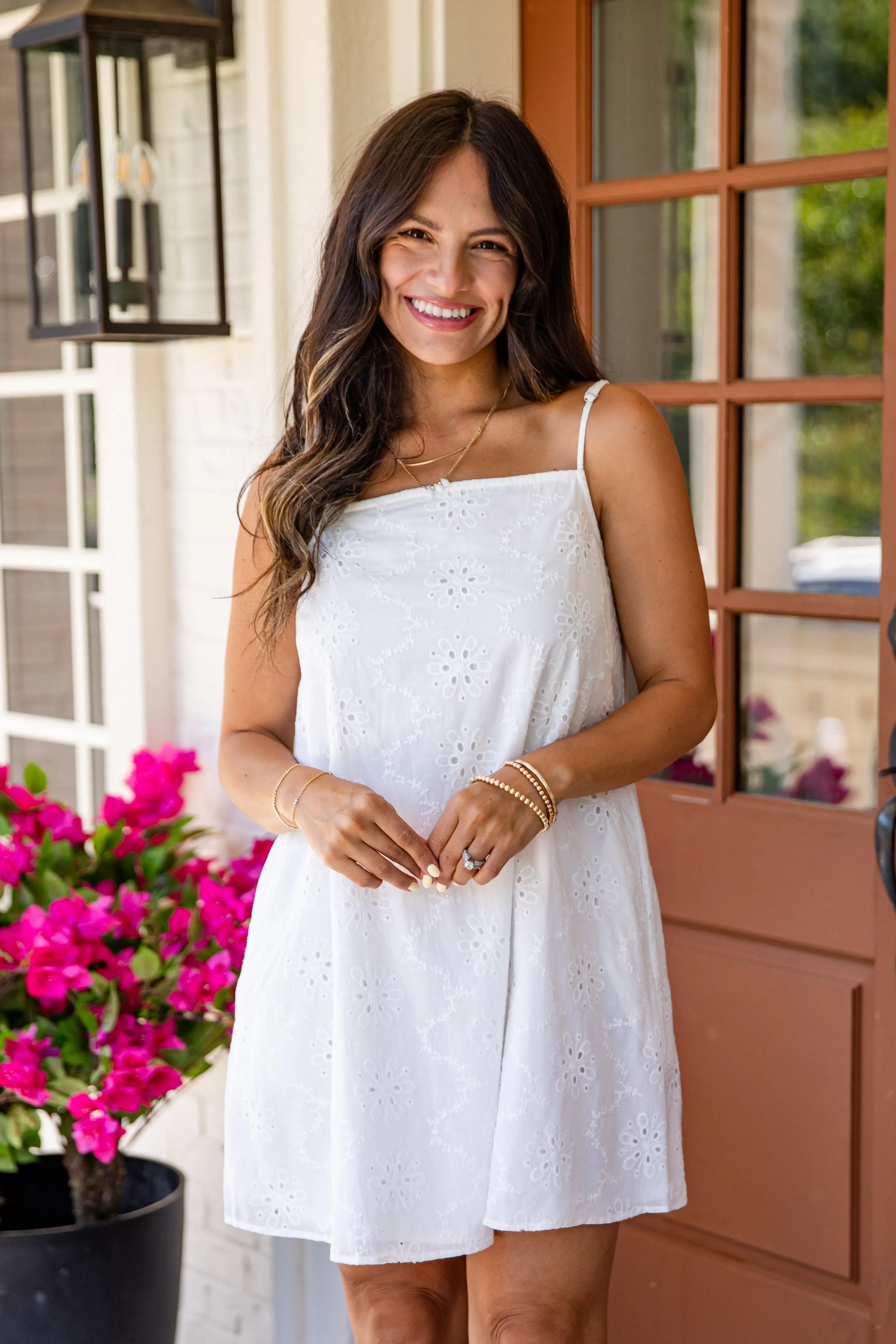 Summer Glow White Eyelet Mini Dress putih dengan bordir detail dari DUNIA SLOT